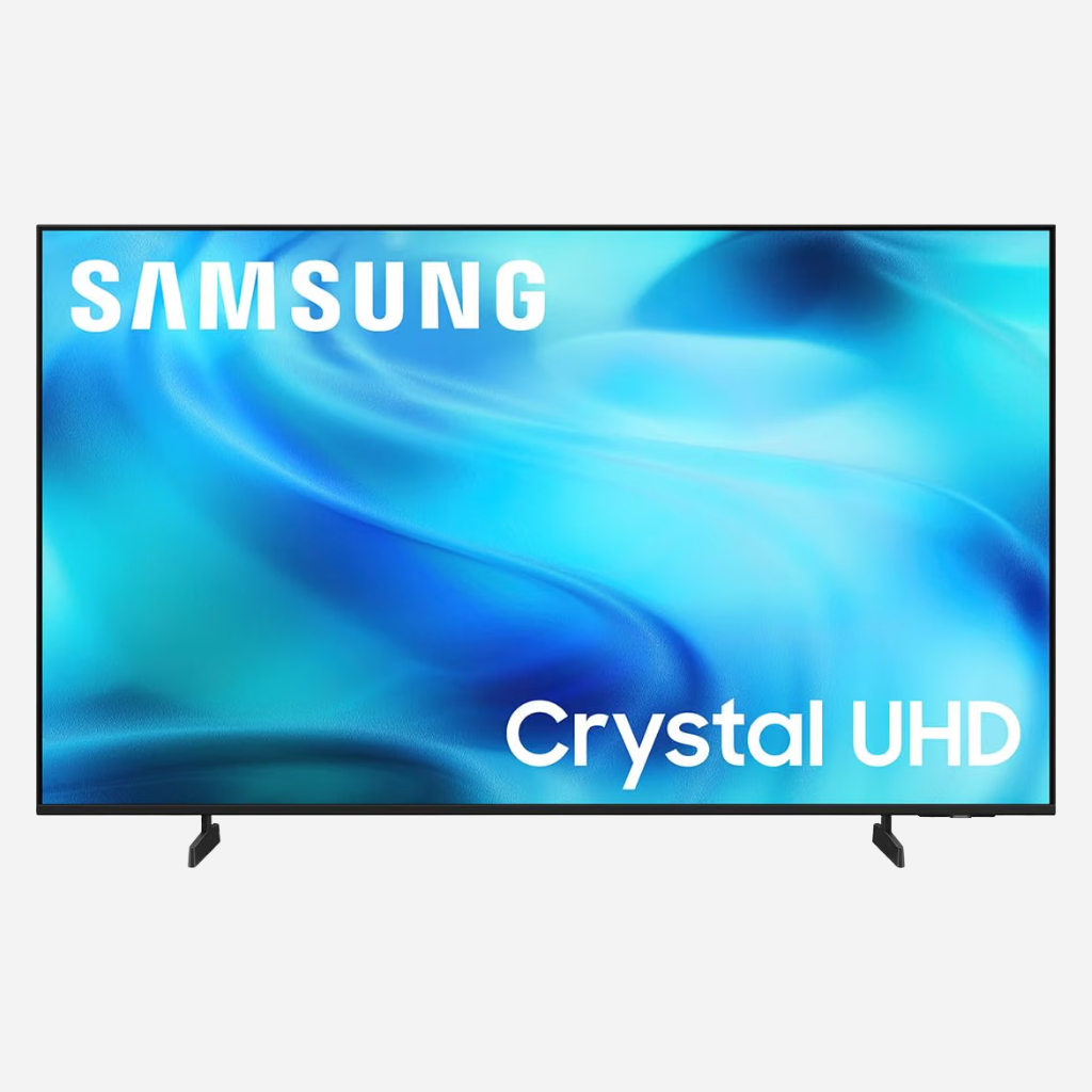 Large 43-inch display on a wide executive desk setup